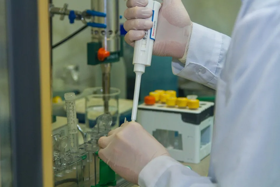 Picture of a scientist doing work that illustrates the importance of a lab notebook